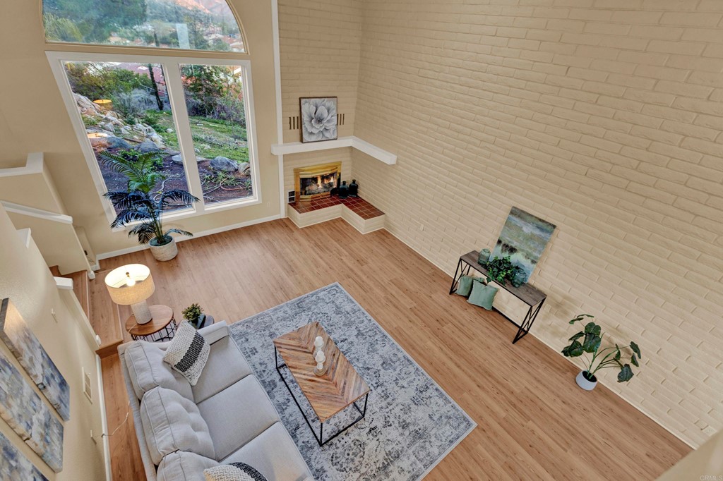 12032 Serena Road Lakeside, CA 92040 - Photo 34 of 55 a living room with furniture and a wooden floor