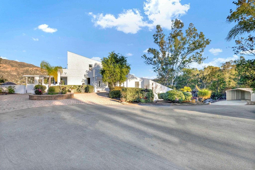 12032 Serena Road Lakeside, CA 92040 - Photo 48 of 55 a view of a street with a building in the background