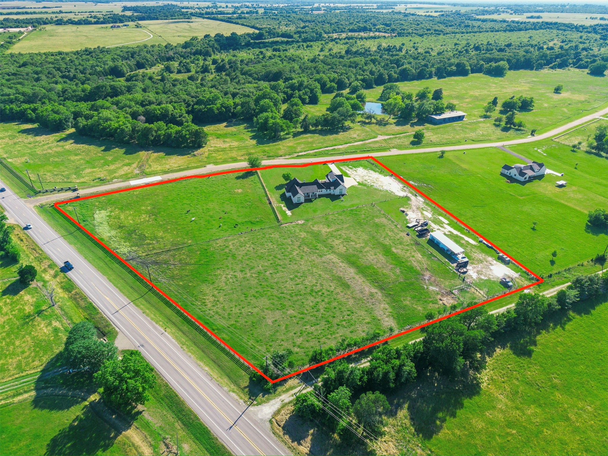 13504 Hudson Farms Road Franklin, TX 77856 - Photo 3 of 49 a view of a golf course with a park