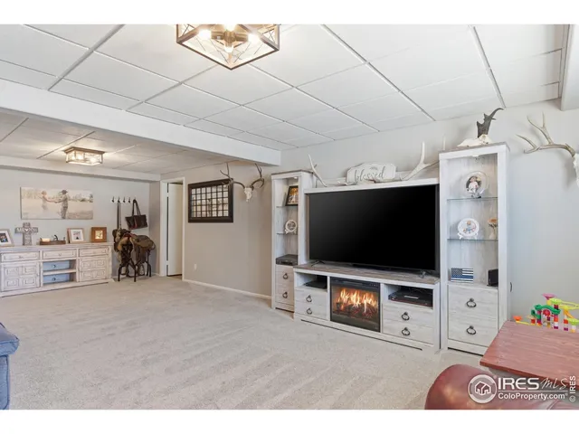 a bed room with a bed and a baby crib