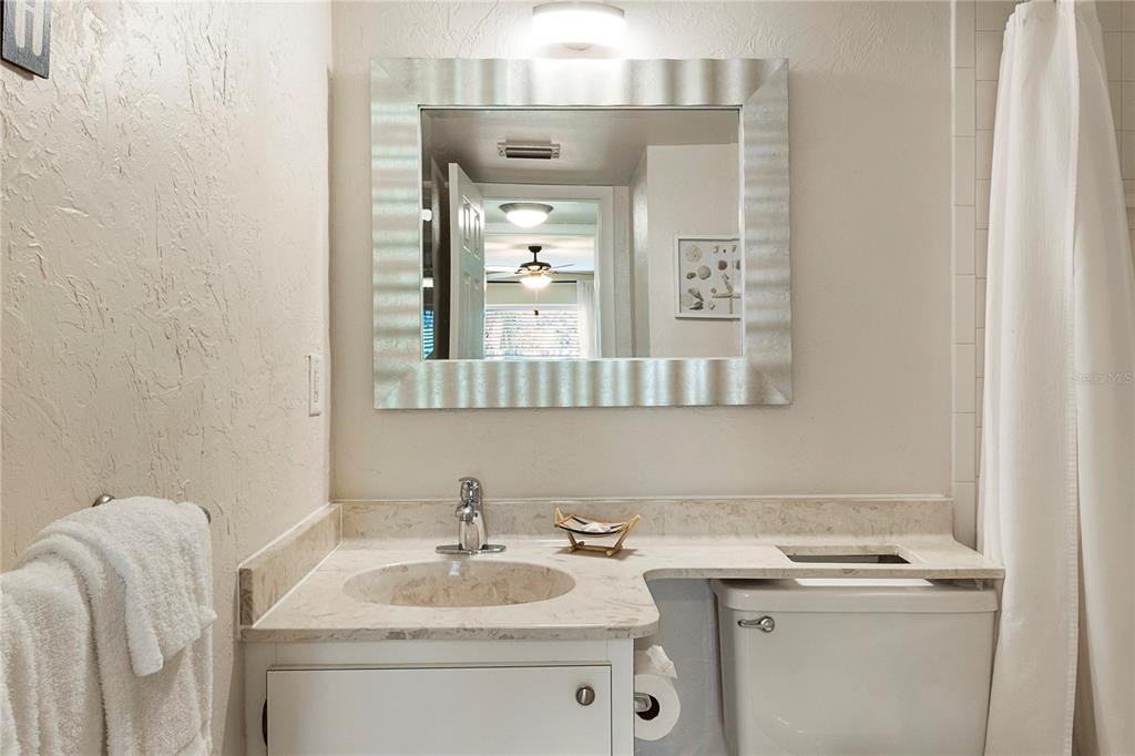 3273 South Beneva Road, Unit 203 Sarasota, FL 34232 - Photo 14 of 36 a bathroom with a sink and a mirror