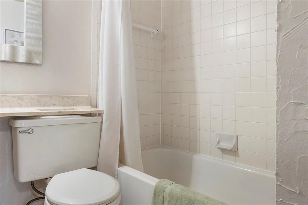 3273 South Beneva Road, Unit 203 Sarasota, FL 34232 - Photo 15 of 36 a bathroom with a sink a toilet and bathtub