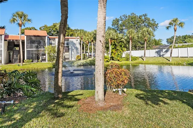 a view of a backyard with sitting area and furniture
