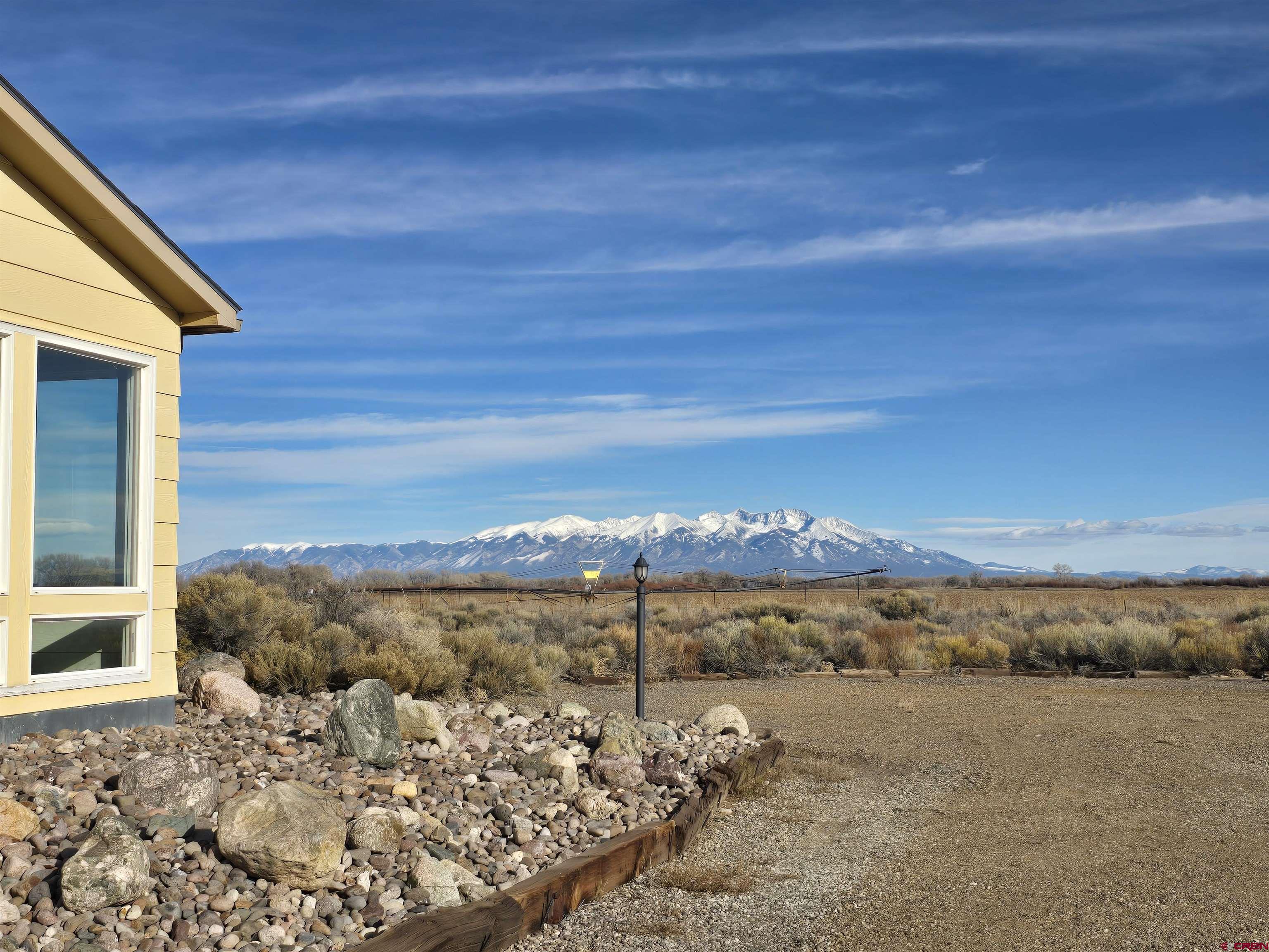 4590 Sierra Vista Road Alamosa, CO 81101 - Photo 25 of 31 a view of a balcony with an ocean view