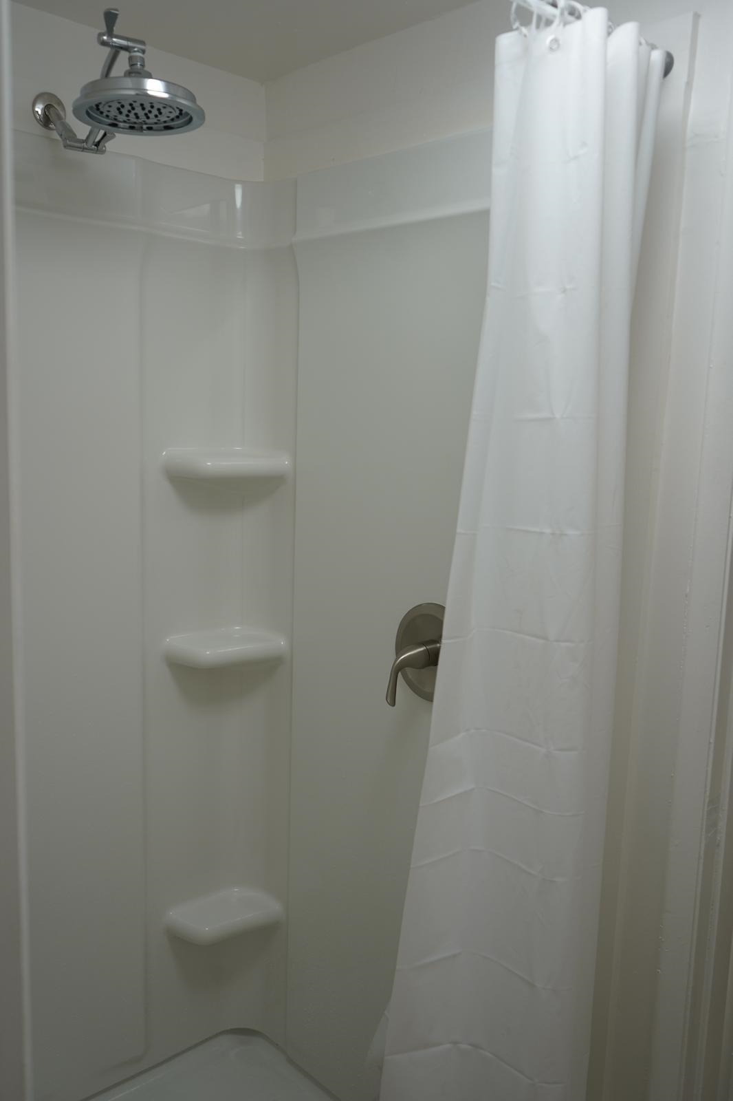 111 Kahului Beach Road, Unit C116 Kahului, HI 96732 - Photo 10 of 14 a bathroom with a shower