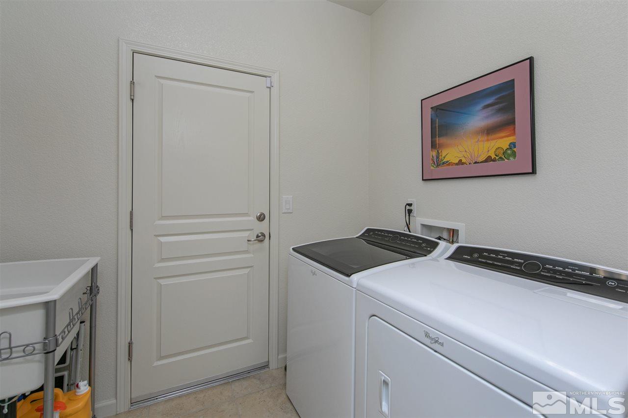 1420 Wakefield Trail Reno, NV 89523 - Photo 17 of 23 a utility room with dryer and washer