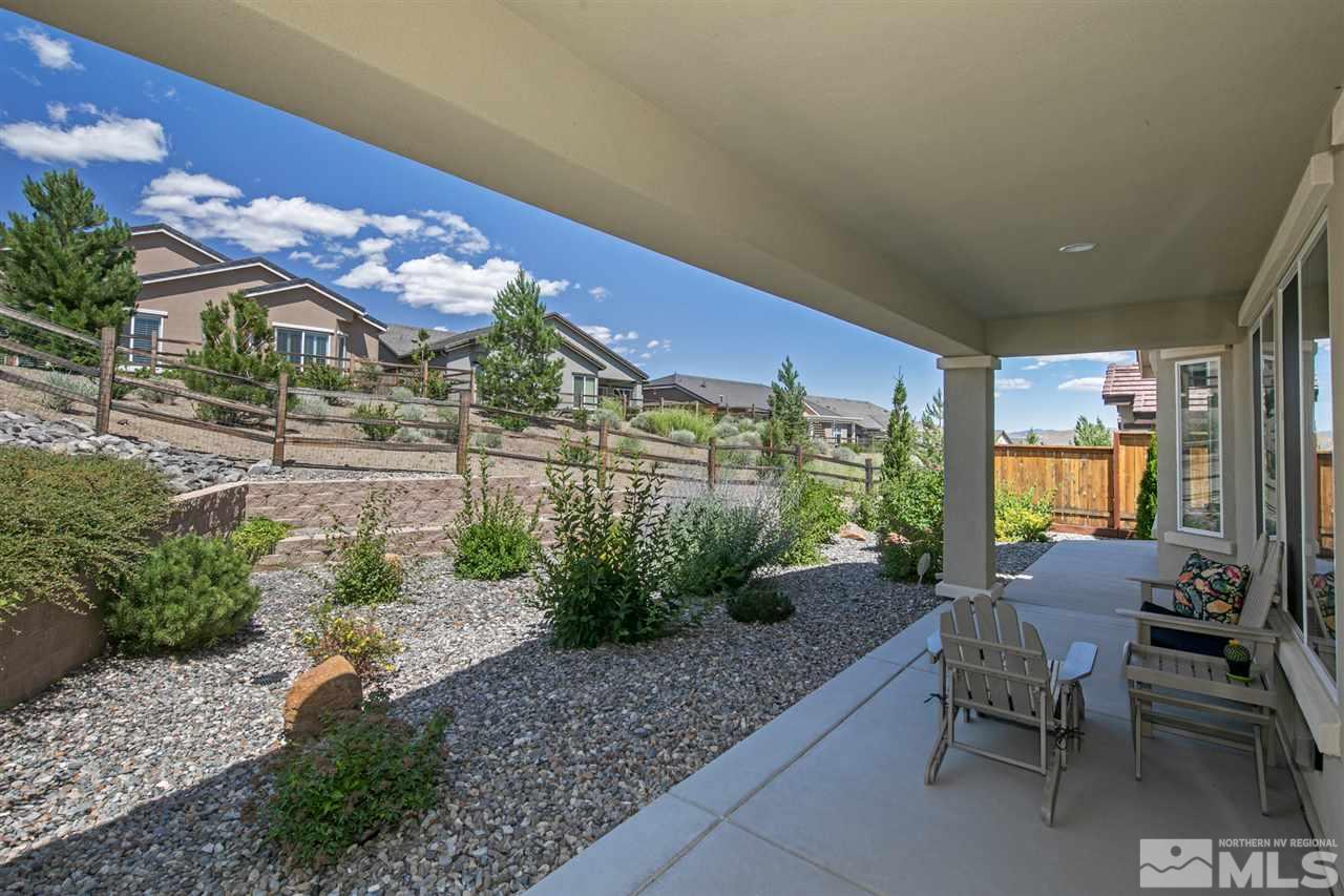 1420 Wakefield Trail Reno, NV 89523 - Photo 18 of 23 a view of a patio with couches and potted plants