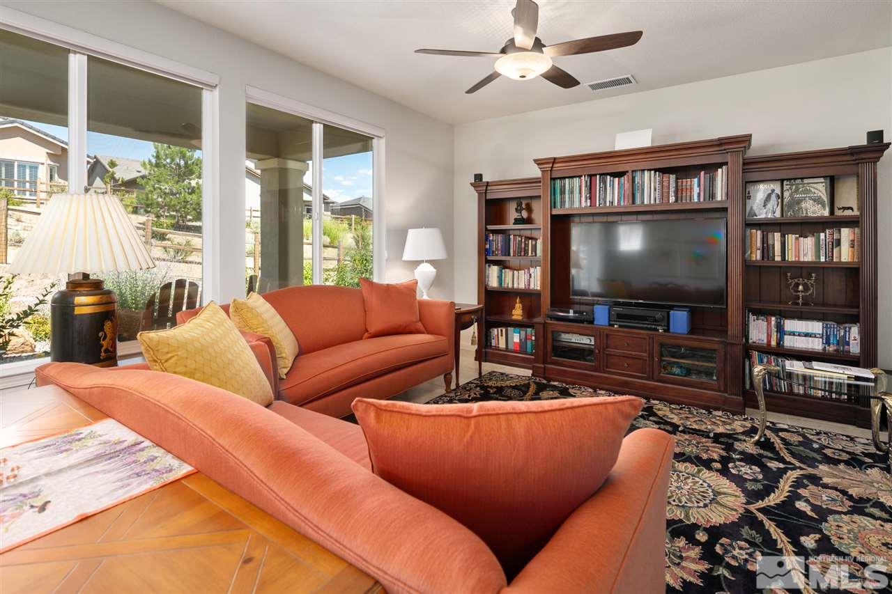 1420 Wakefield Trail Reno, NV 89523 - Photo 4 of 23 a living room with furniture and a flat screen tv