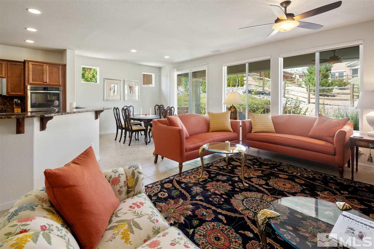1420 Wakefield Trail Reno, NV 89523 - Photo 5 of 23 a living room with furniture and a window