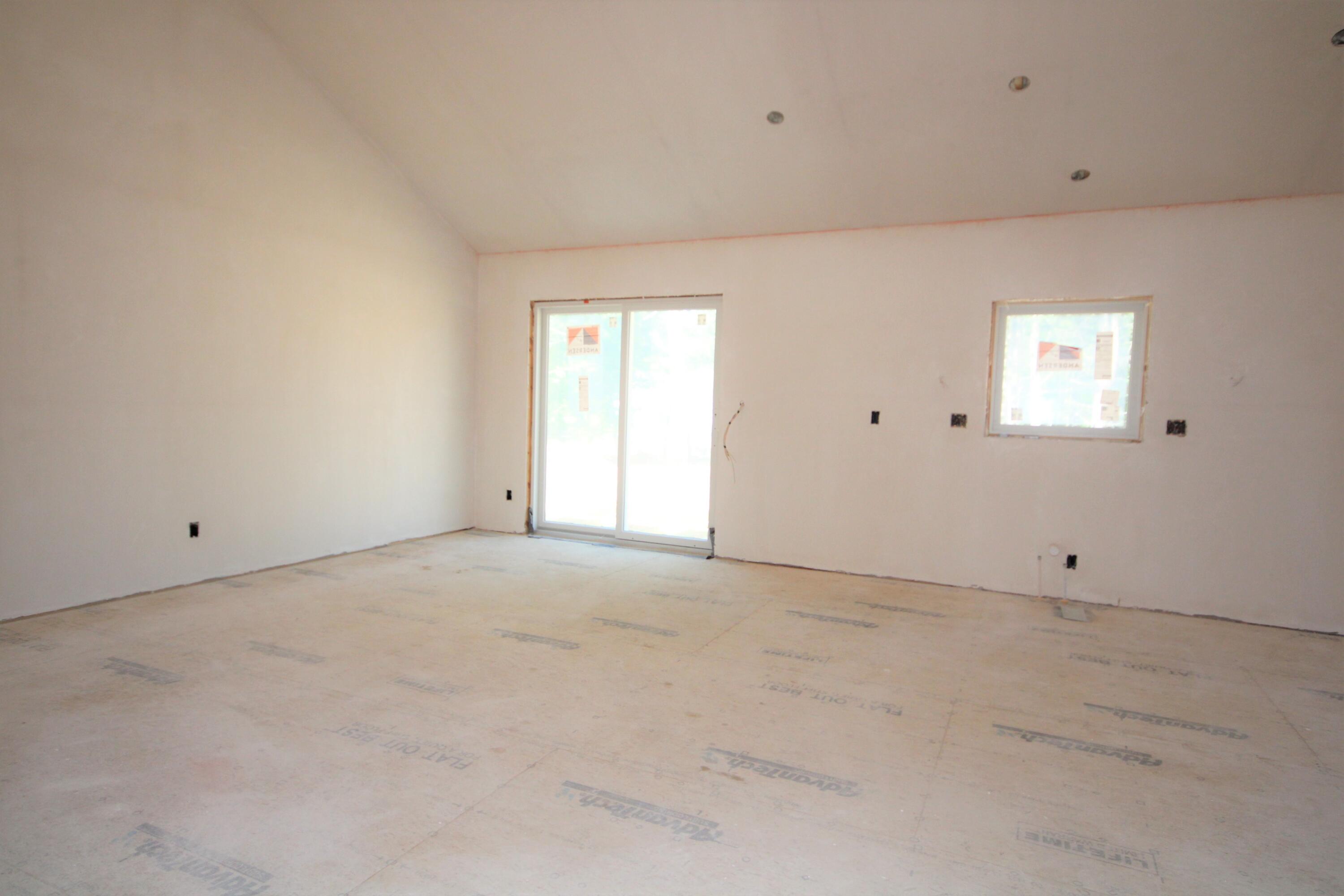 61 Lewis Neck Road East Falmouth, MA 02536 - Photo 13 of 37 a view of an empty room with a window