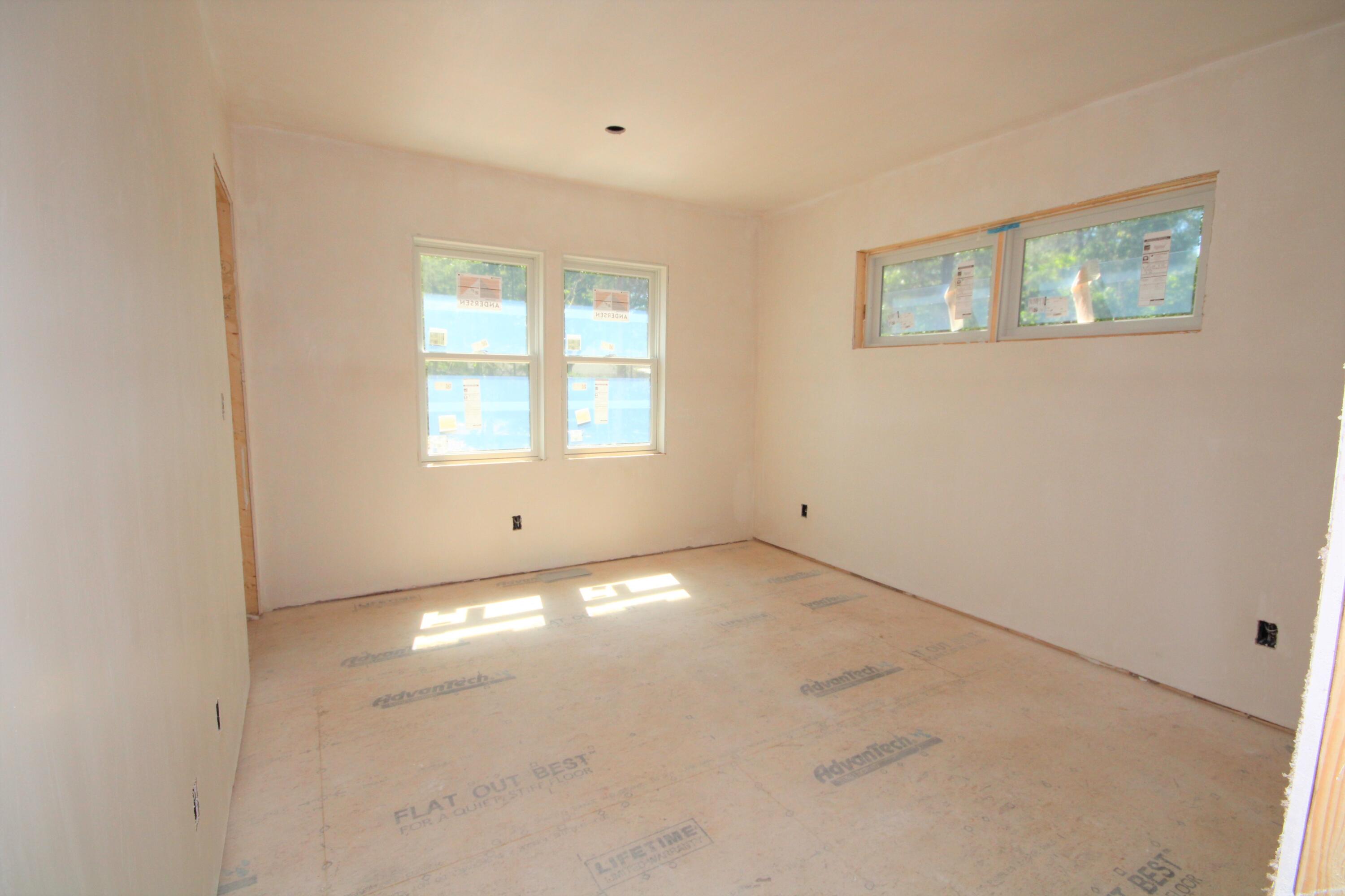 61 Lewis Neck Road East Falmouth, MA 02536 - Photo 21 of 37 an empty room with windows and closet