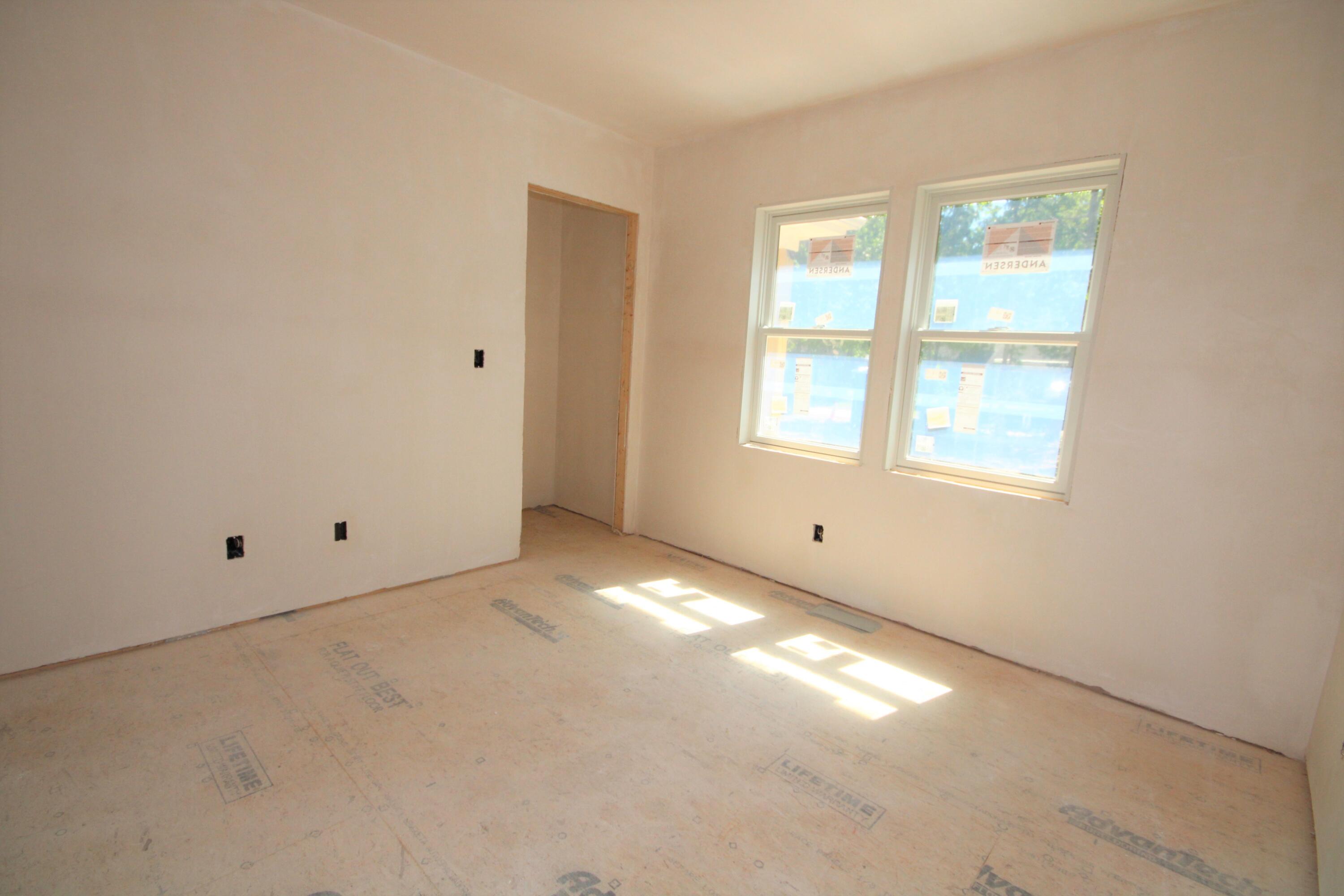 61 Lewis Neck Road East Falmouth, MA 02536 - Photo 22 of 37 an empty room with windows