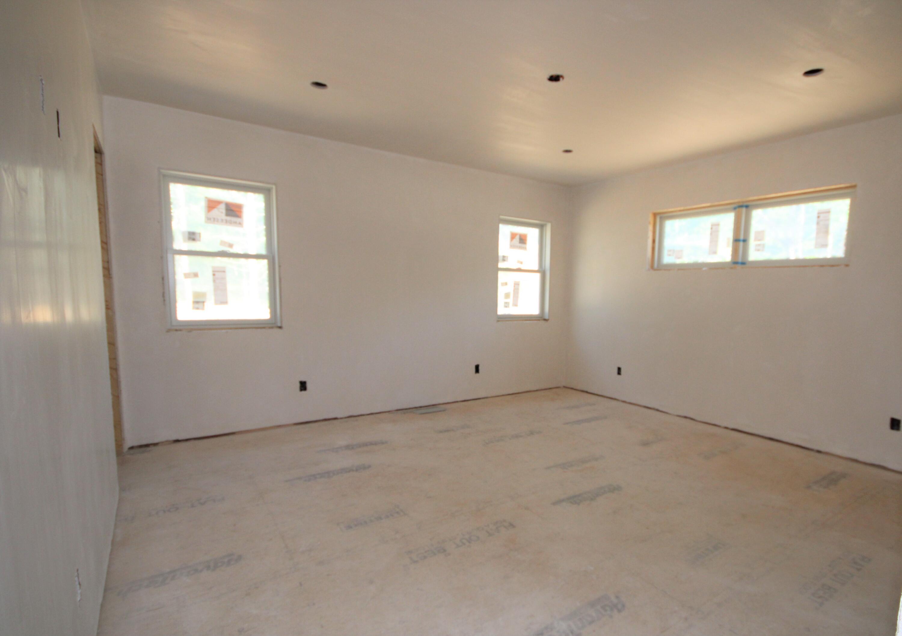 61 Lewis Neck Road East Falmouth, MA 02536 - Photo 25 of 37 a view of an empty room with a window