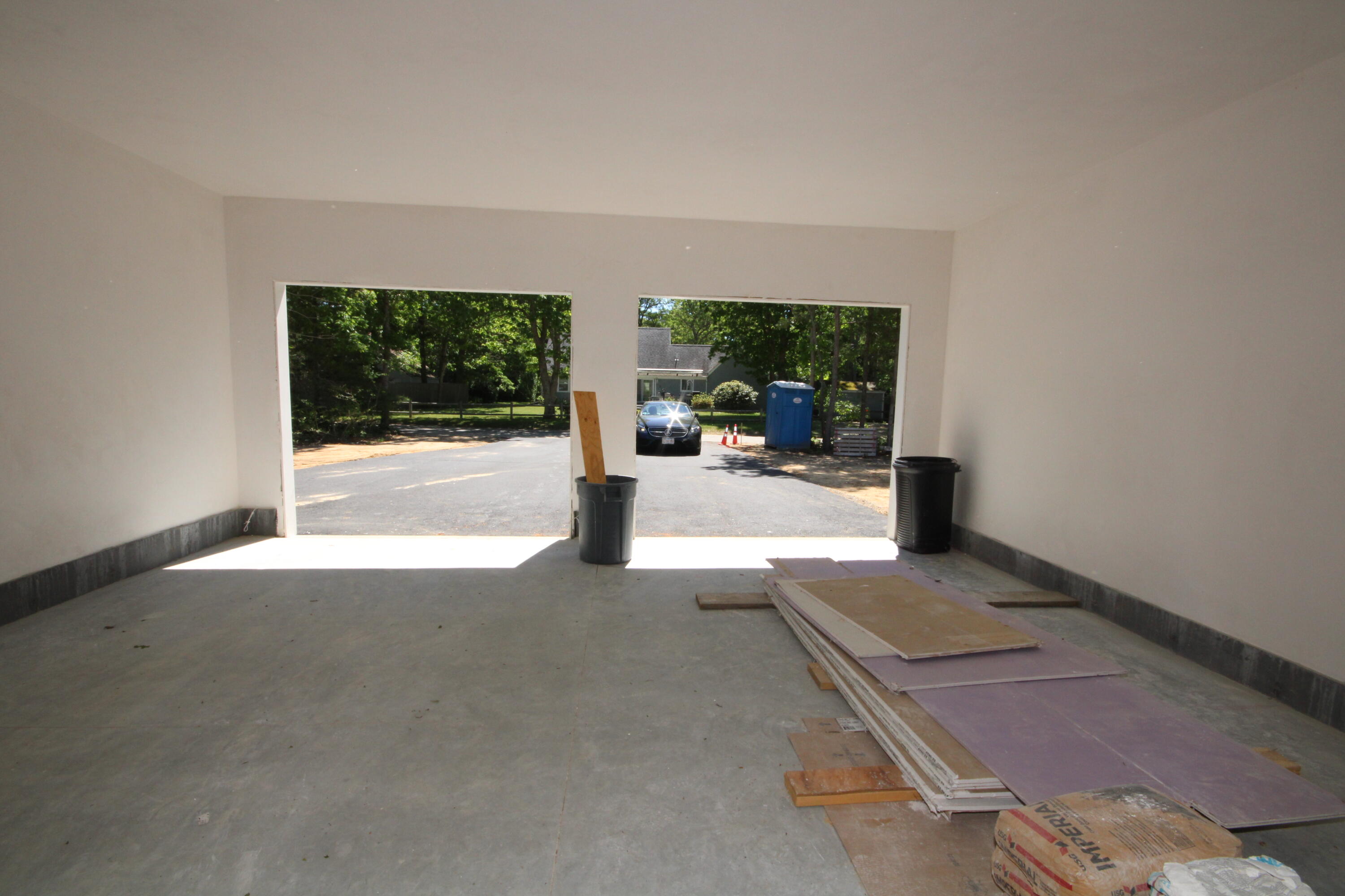 61 Lewis Neck Road East Falmouth, MA 02536 - Photo 35 of 37 an empty room with floor to ceiling window and an outdoor view