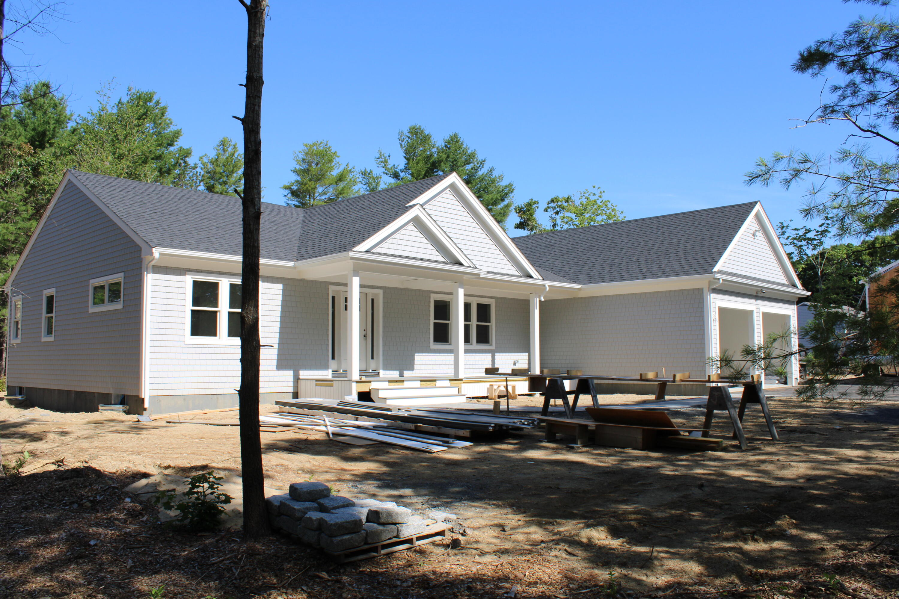 61 Lewis Neck Road East Falmouth, MA 02536 - Photo 37 of 37 a front view of a house with a yard