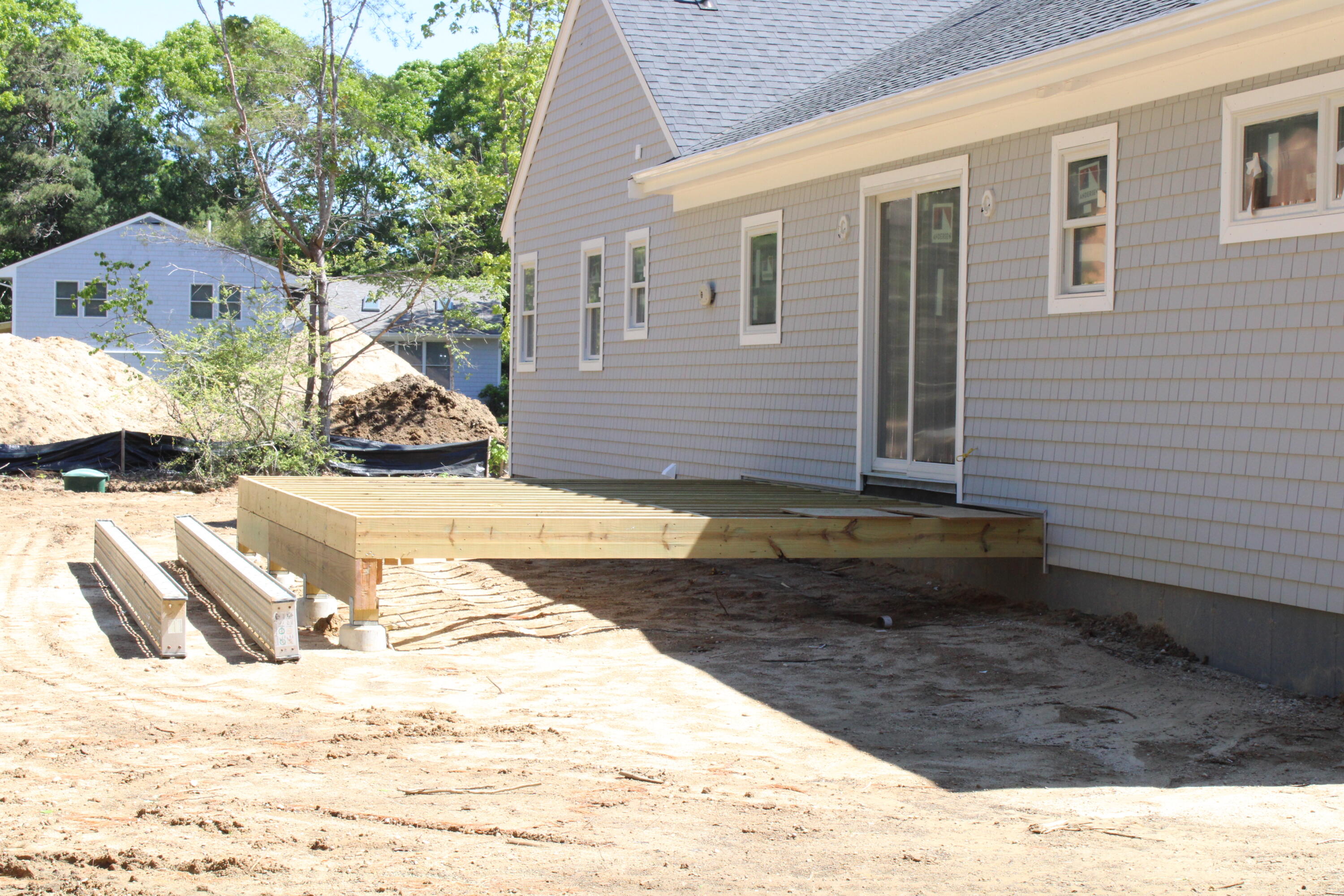 61 Lewis Neck Road East Falmouth, MA 02536 - Photo 7 of 37 a view of a backyard of the house