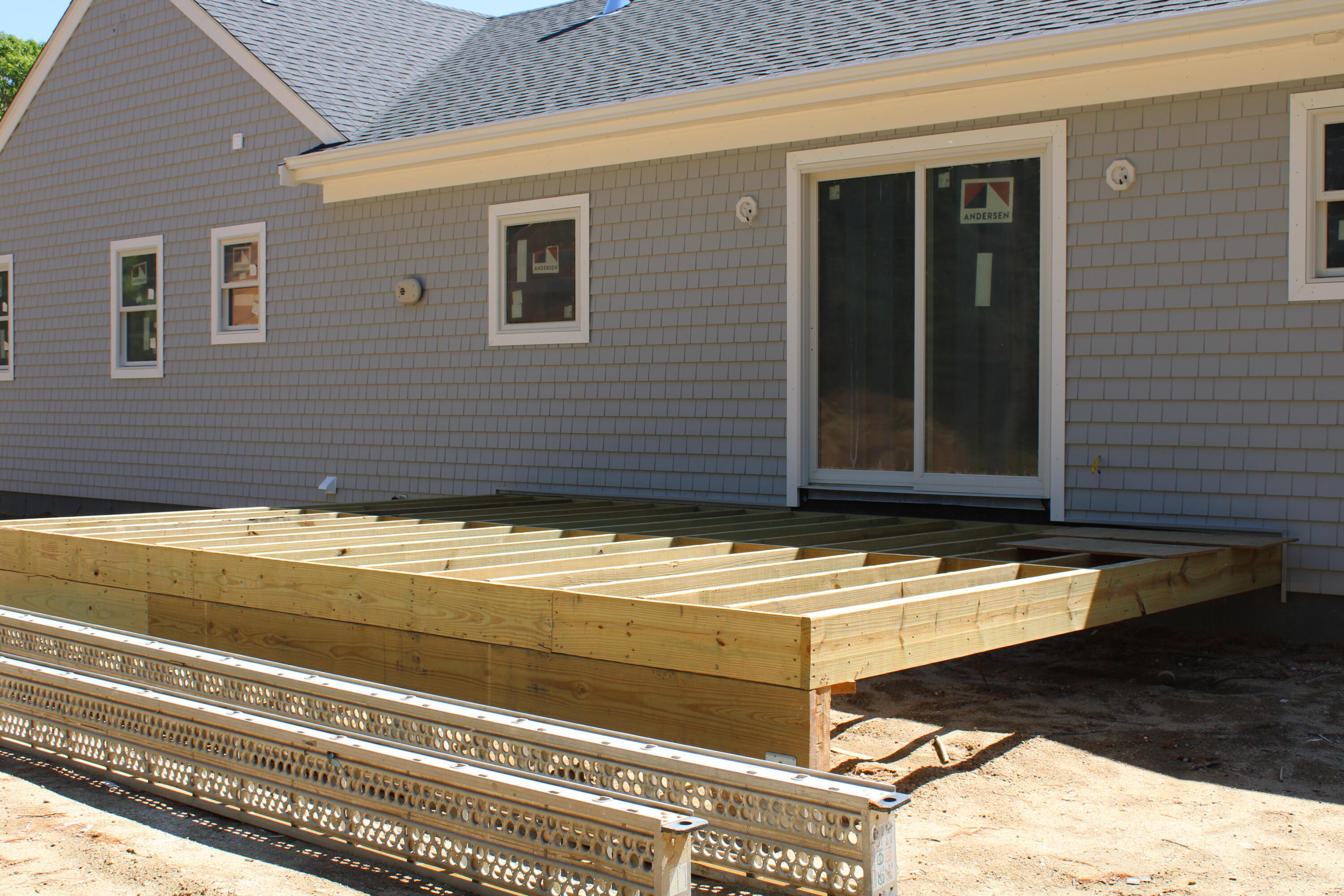 61 Lewis Neck Road East Falmouth, MA 02536 - Photo 8 of 37 a view of a house with a backyard