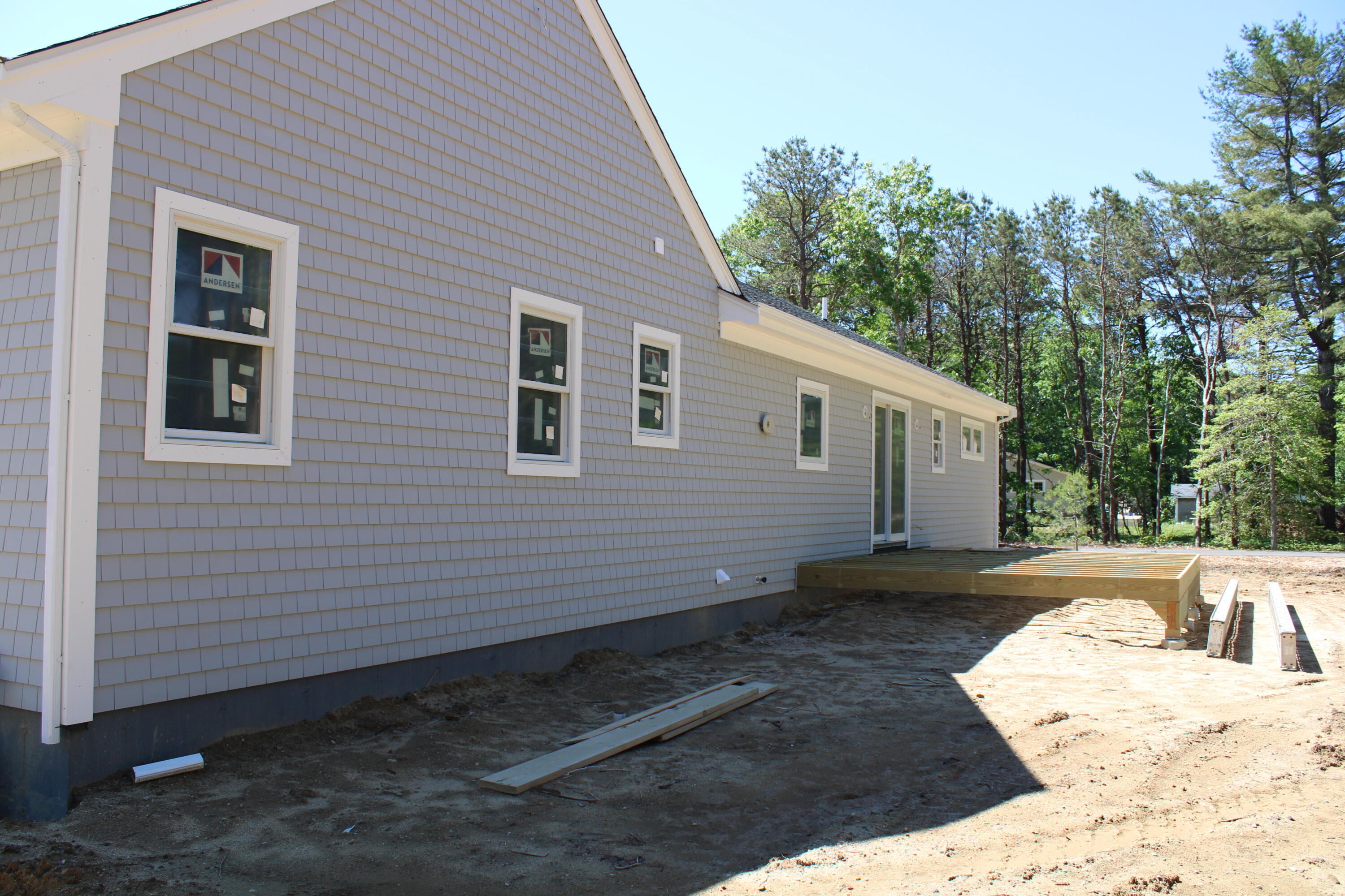 61 Lewis Neck Road East Falmouth, MA 02536 - Photo 10 of 37 a view of a house with a yard