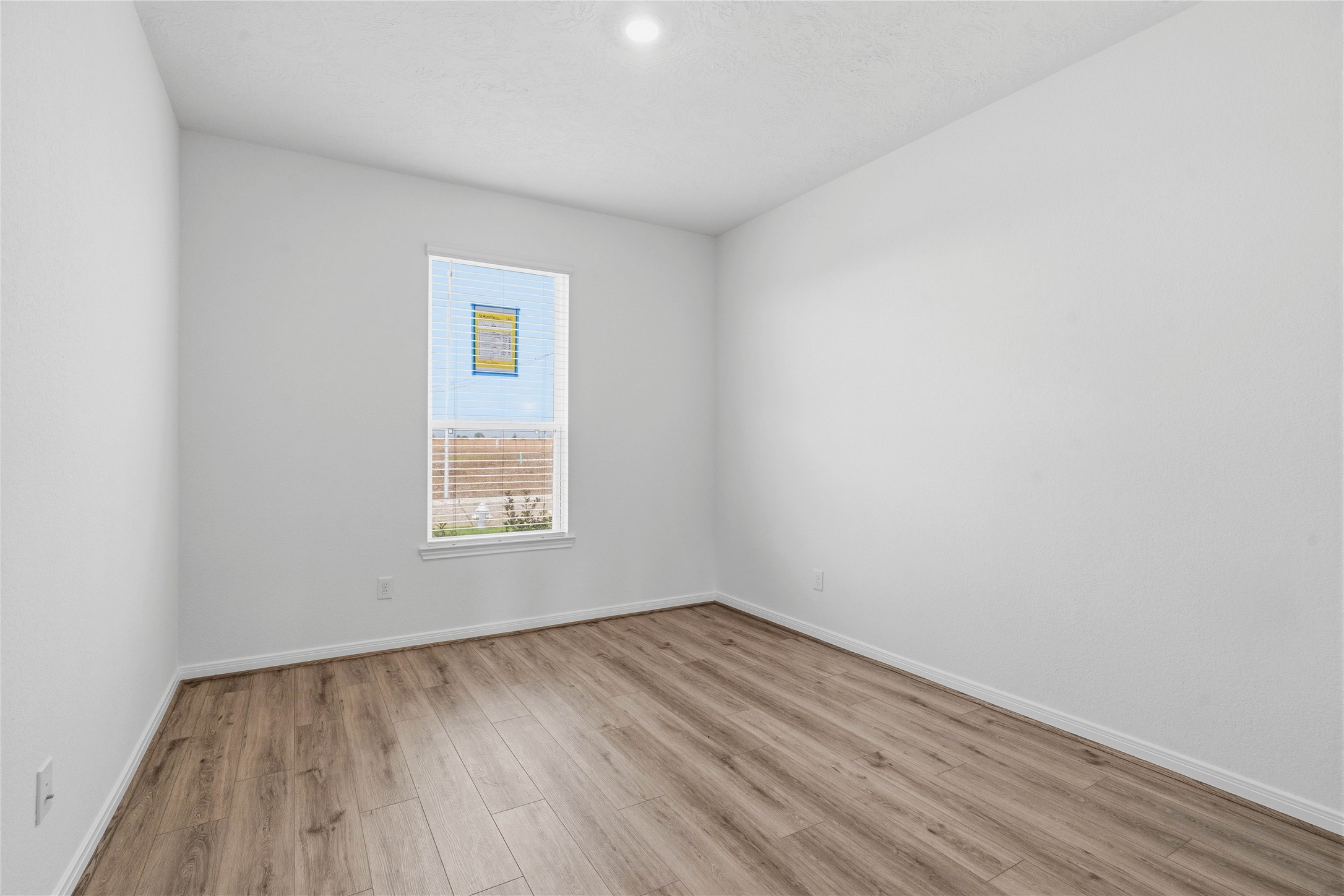 2503 Spruce Hl Road Beasley, TX 77417 - Photo 7 of 31 Located at the front of the home is this versatile Den which features great natural light and offers the perfect flexible footprint for a dedicated home office, a quiet reading room, or an intimate formal living space.