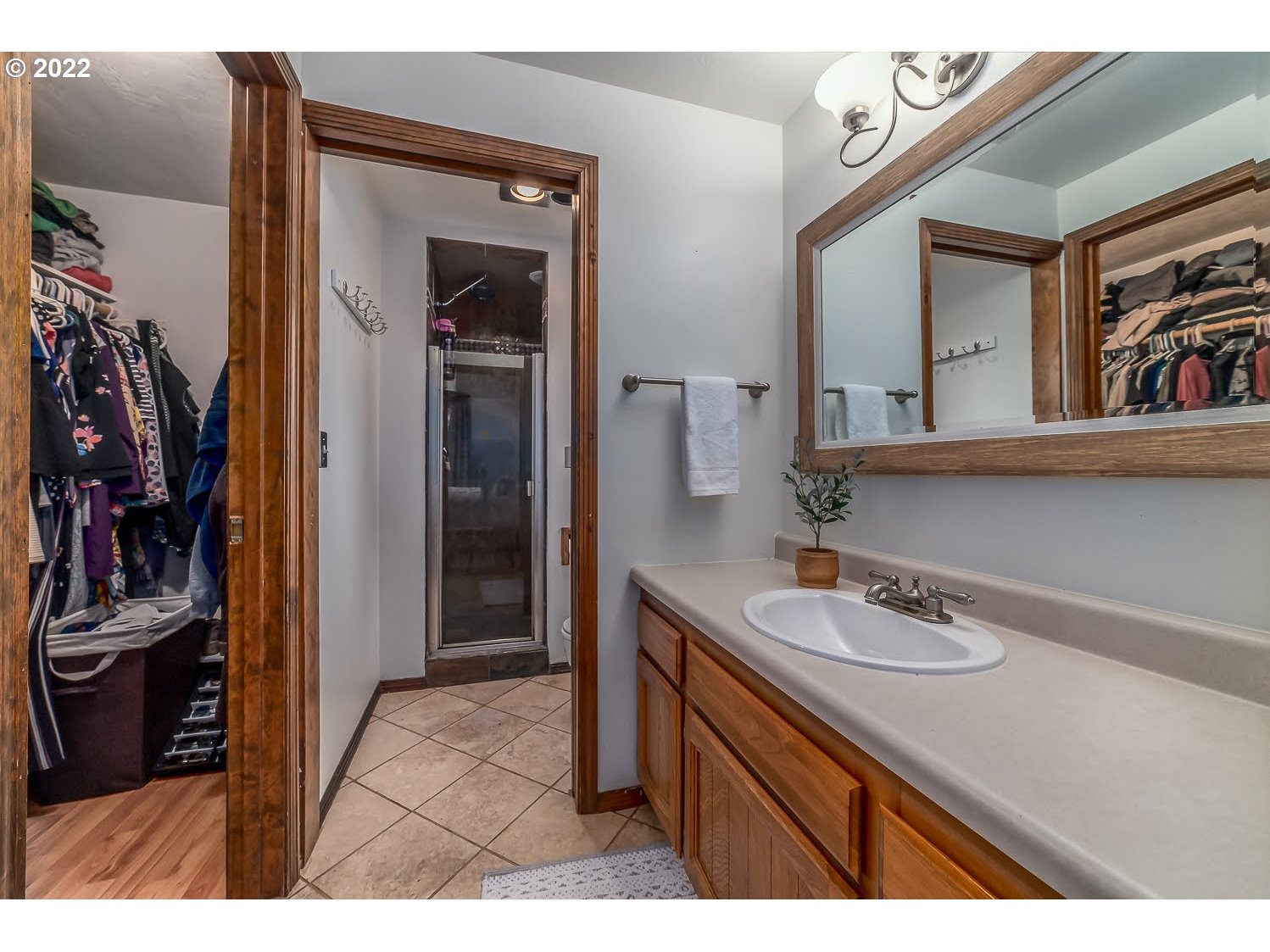 447 Cascade Drive Springfield, OR 97478 - Photo 17 of 32 a bathroom with a sink vanity and a mirror