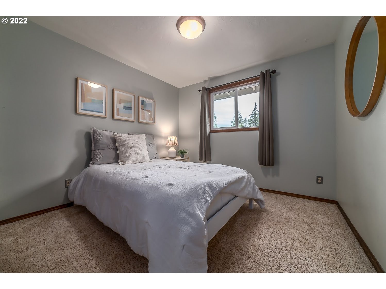 447 Cascade Drive Springfield, OR 97478 - Photo 19 of 32 a bedroom with a bed and a window