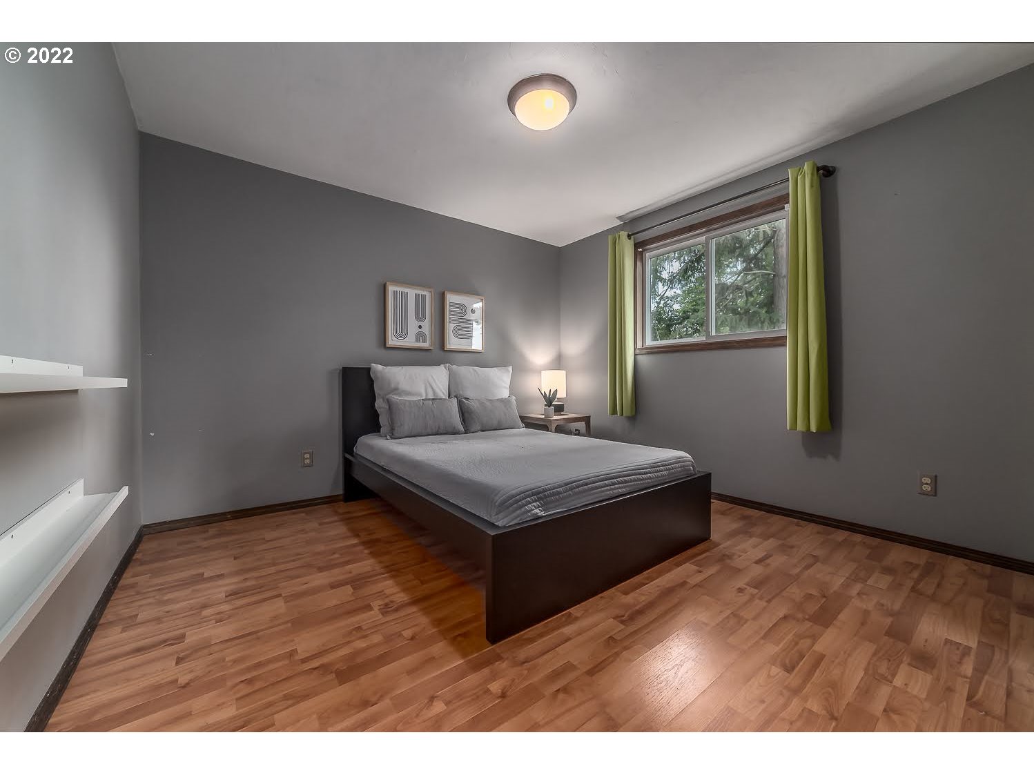 447 Cascade Drive Springfield, OR 97478 - Photo 20 of 32 a bedroom with a bed and a window