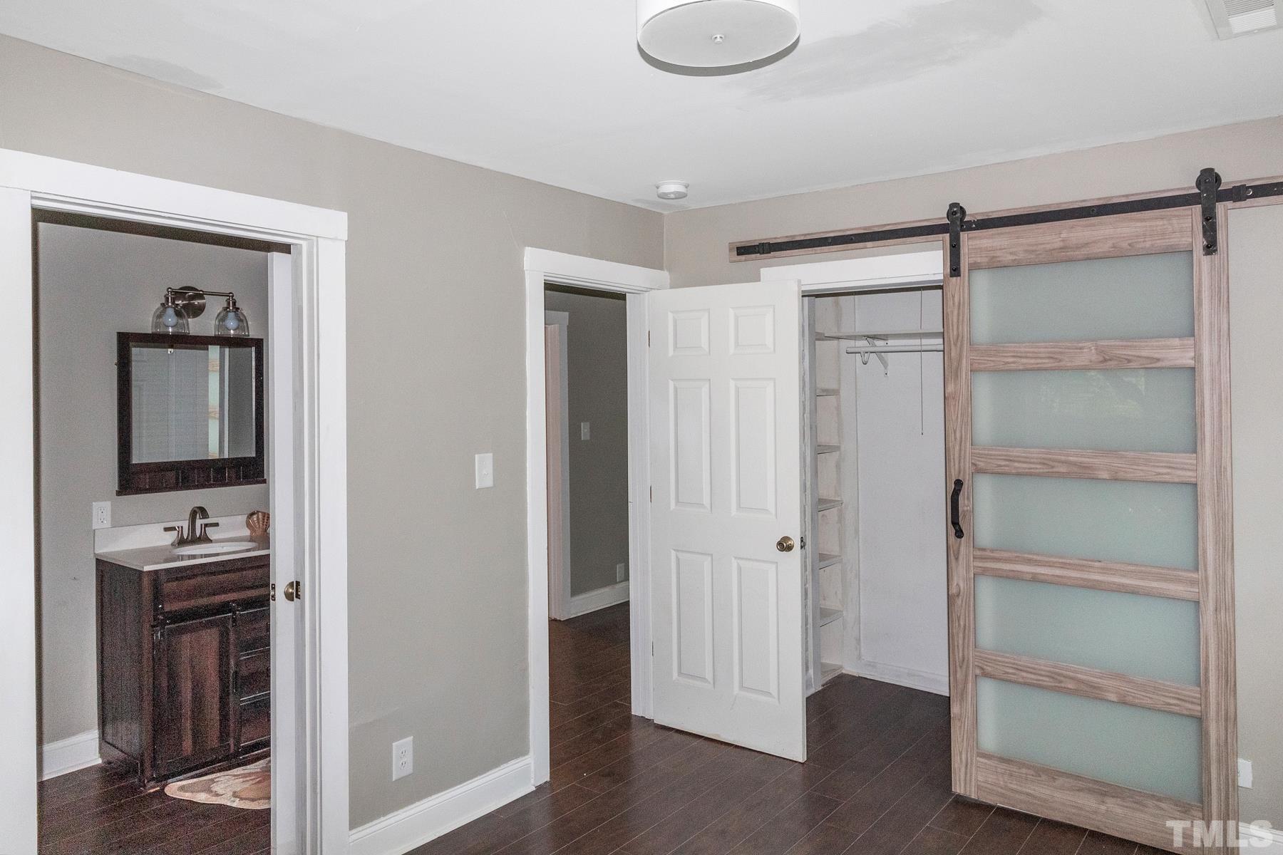 1401 Robinhood Road Durham, NC 27701 - Photo 11 of 14 a view of empty room with wooden floor