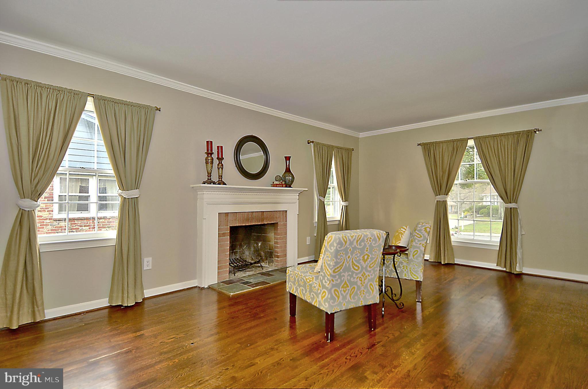 2003 Gatewood Place Silver Spring, MD 20903 - Photo 2 of 29 Sun-drenched living room w/fireplace