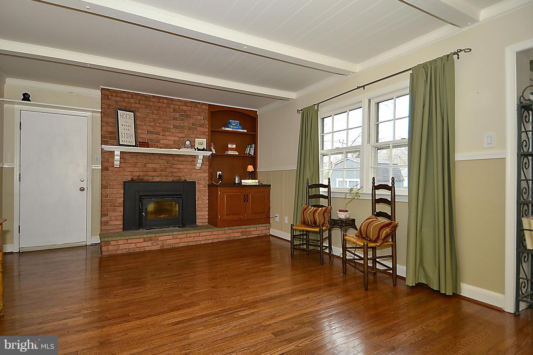 2003 Gatewood Place Silver Spring, MD 20903 - Photo 6 of 29 Family room w/ wood burning stove
