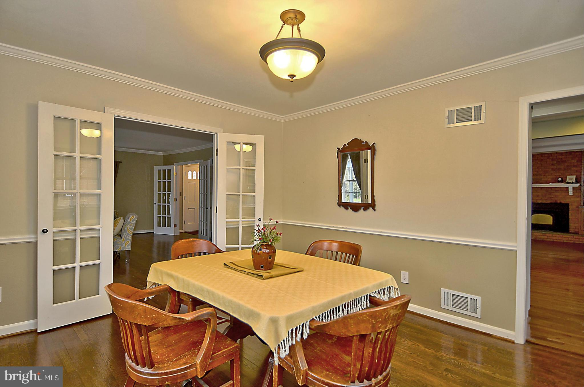 2003 Gatewood Place Silver Spring, MD 20903 - Photo 10 of 29 Chair railing and crown molding
