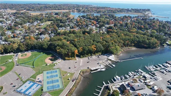 an aerial view of a house with outdoor space