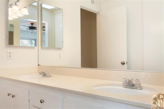 70415 Cobb Road Rancho Mirage, CA 92270 - Photo 14 of 23 a bathroom with a sink and a mirror