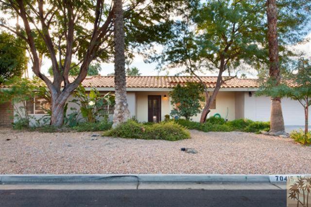 70415 Cobb Road Rancho Mirage, CA 92270 - Photo 3 of 23 front view of a house with a yard