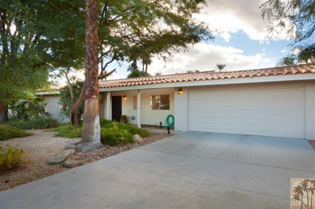 70415 Cobb Road Rancho Mirage, CA 92270 - Photo 4 of 23 a front view of a house with garden