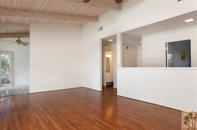 70415 Cobb Road Rancho Mirage, CA 92270 - Photo 7 of 23 a view of a room with wooden floor and a window