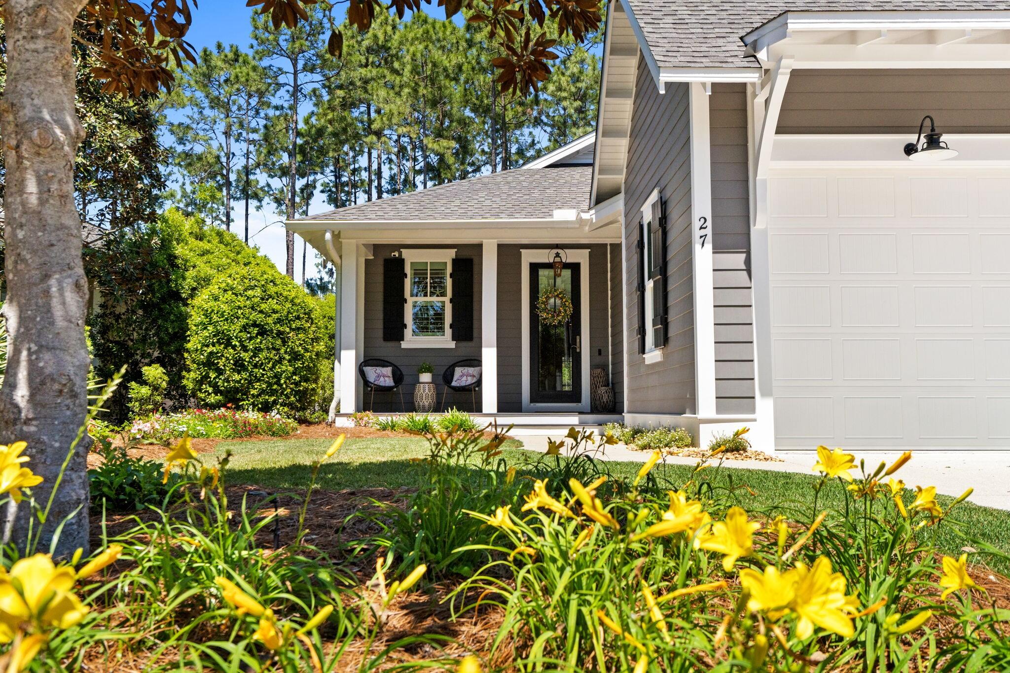 front view of a house with a yard