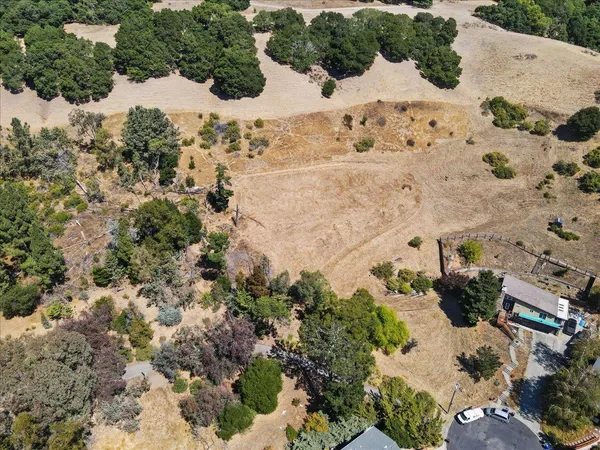 a view of a yard covered with snow