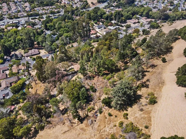 an aerial view of mountain with outdoor space