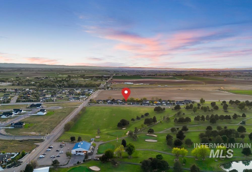 25074 The Driving Lane Caldwell, ID 83607 - Photo 3 of 32 Aerial perspective showcasing expansive green spaces and rural landscapes