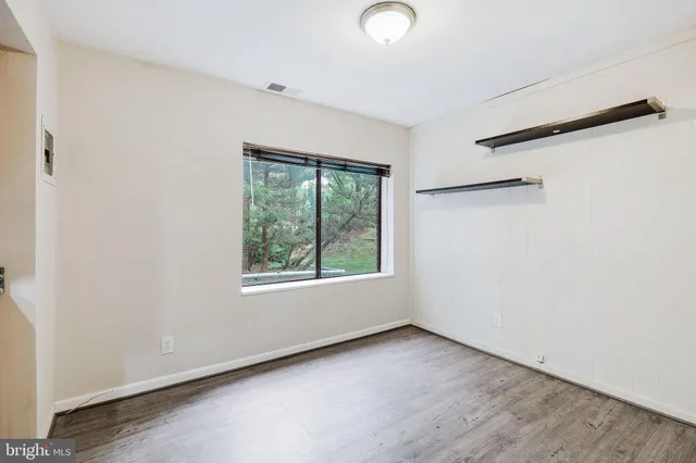 an empty room with a window