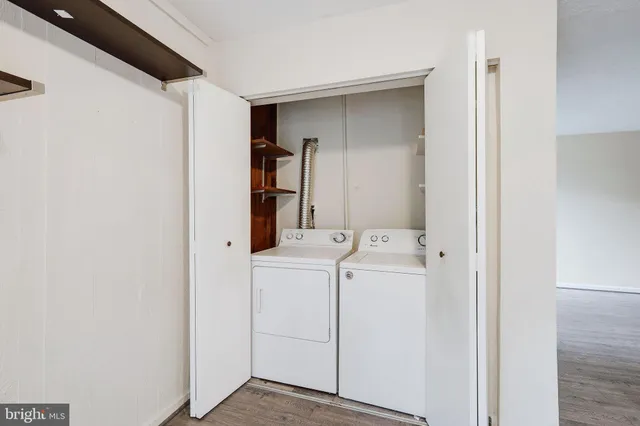 a utility room with dryer and washer