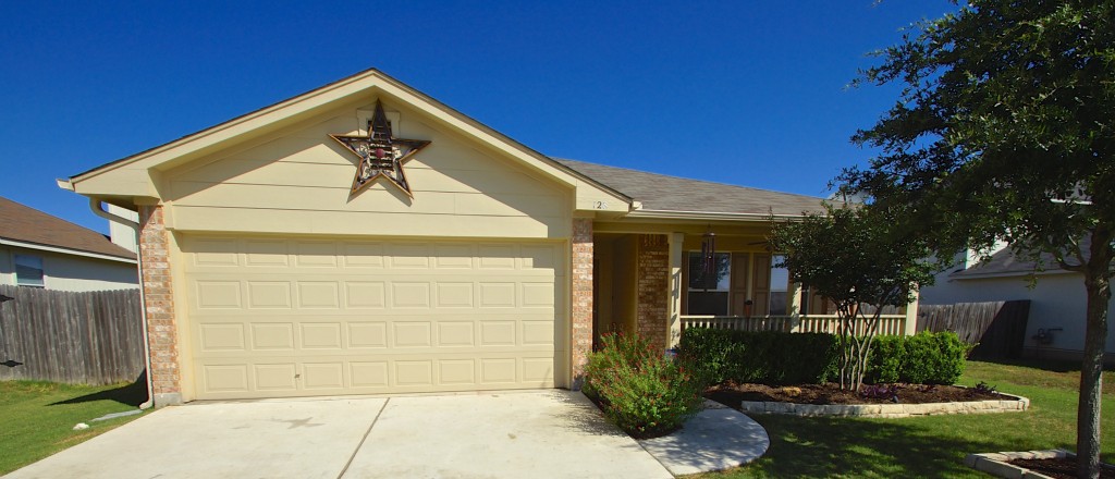 a view of house with outdoor space and yard