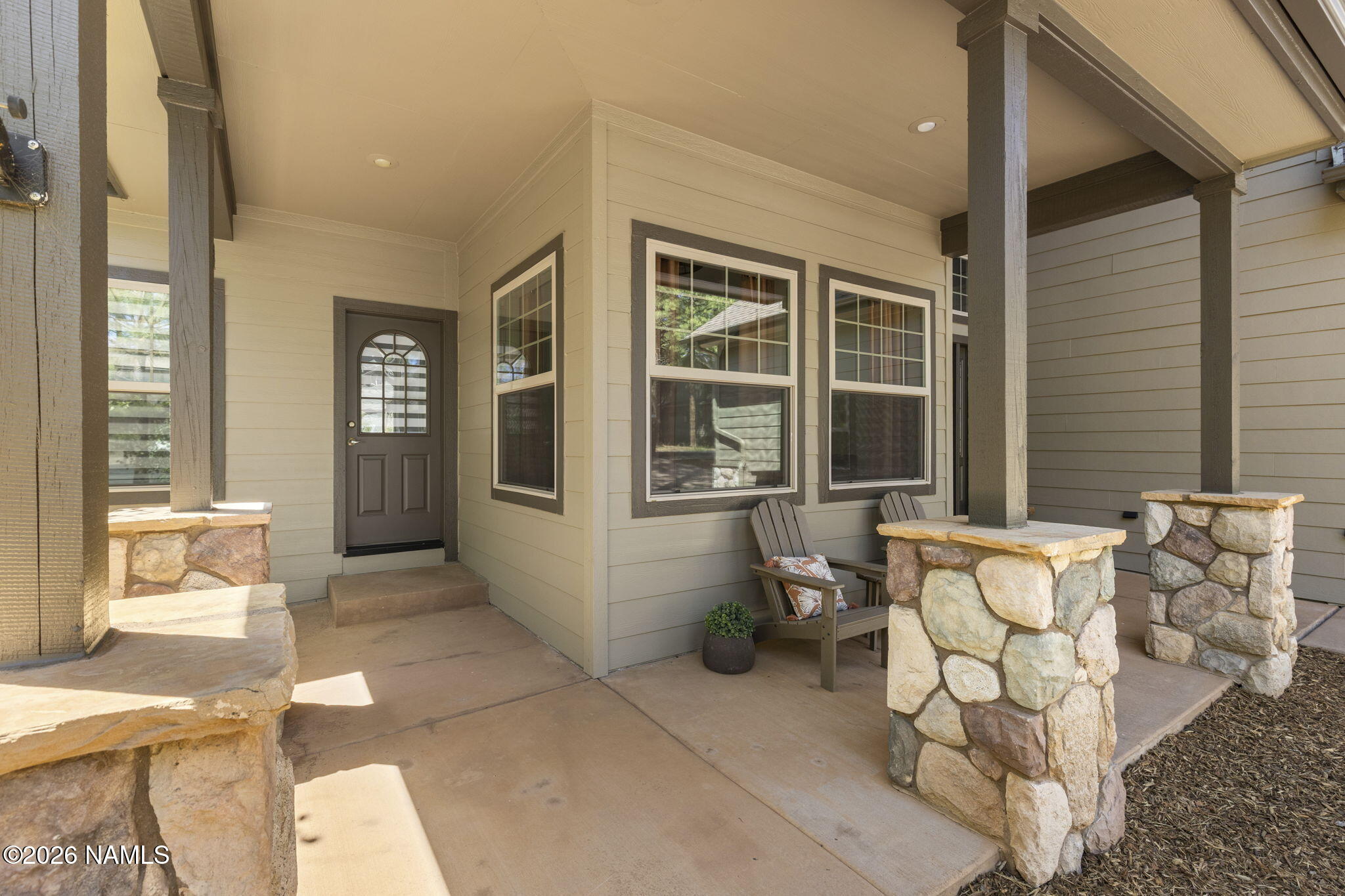 3495 West Lead Rope Flagstaff, AZ 86005 - Photo 6 of 49 a living room with furniture and large windows