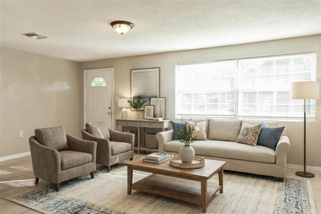 1105 West Nassau Street Tampa, FL 33607 - Photo 3 of 22 a living room with furniture and a large window