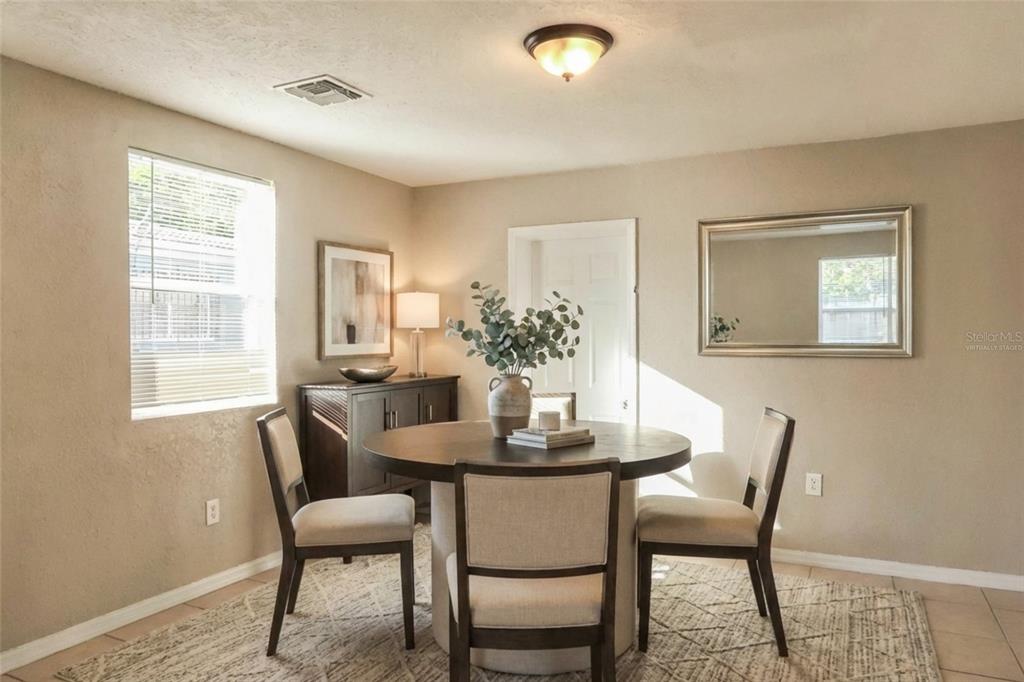 1105 West Nassau Street Tampa, FL 33607 - Photo 4 of 22 a dining room with furniture and window