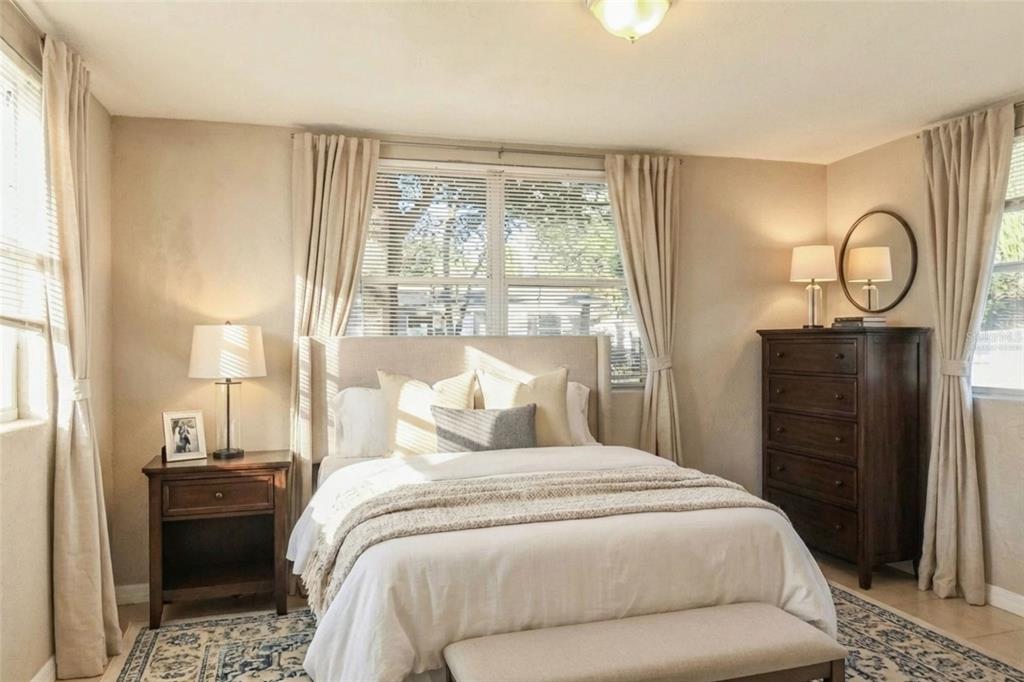 1105 West Nassau Street Tampa, FL 33607 - Photo 6 of 22 a bedroom with a bed and a large window