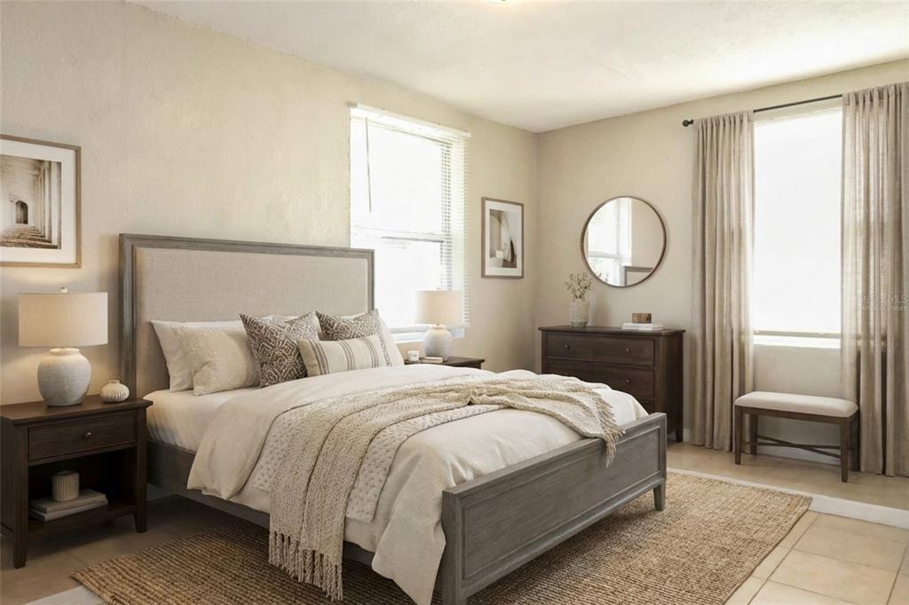 1105 West Nassau Street Tampa, FL 33607 - Photo 8 of 22 a bedroom with a bed and a window