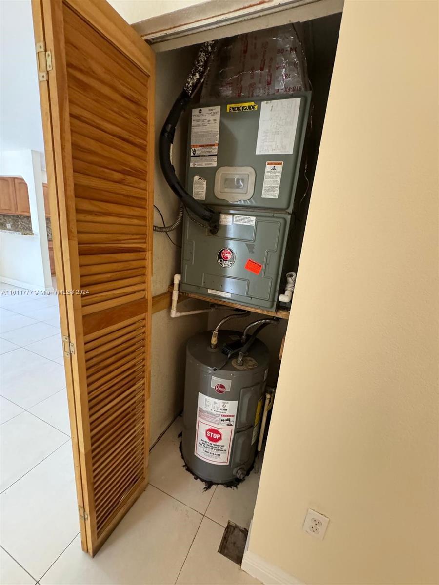 6920 Northwest 4th Avenue, Unit FRONT Miami, FL 33150 - Photo 12 of 13 a bathroom with a sink and a mirror