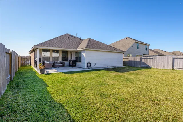 a house view with a garden space