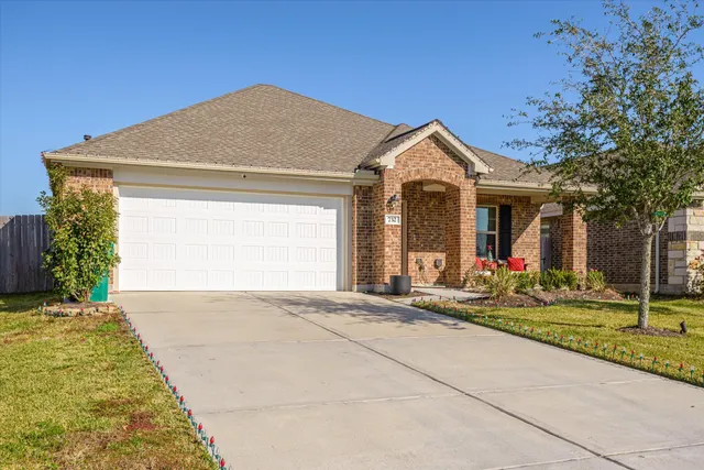 a front view of a house with entertaining space